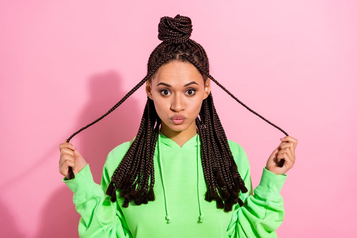 Woman with feed-in braids styled in Minnesota